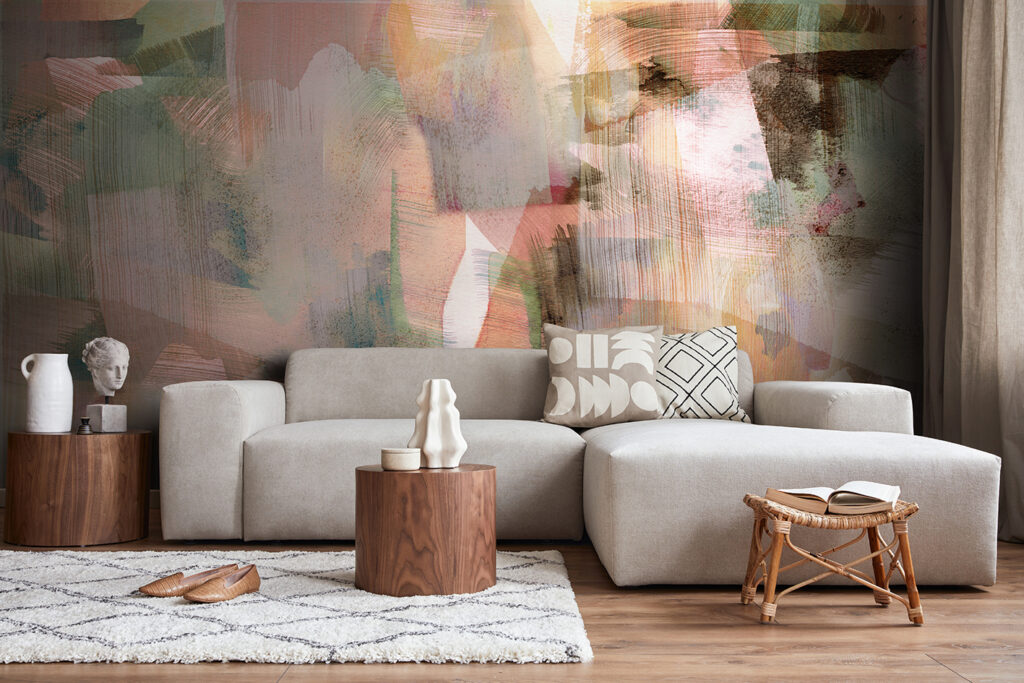 Abstract mural wallpaper with bold brush strokes. Designer wall mural set on a beige living room wall