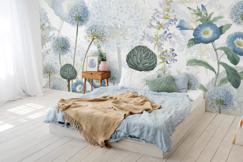 Light blue mural wallpaper of large florals, installed on a contemporary style bedroom. Baubauwall wallpapers