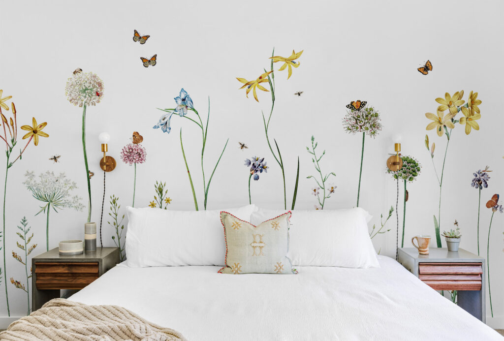 Floral mural wallpaper on a bedroom feature wall