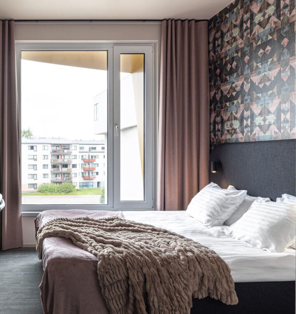 Checkered Geometry Wallpaper at a hotel bedroom feature wall