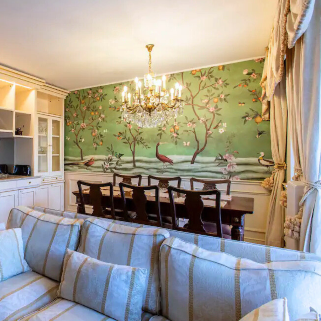 Green chinoiserie wallpaper at a luxurious living room