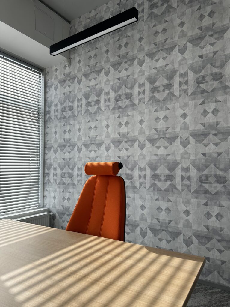 Commercial space repeat pattern wallpaper at an office wall