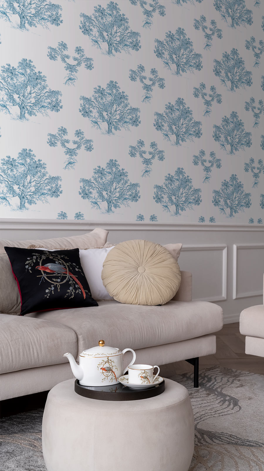 Toile de Jouy style pattern wallpaper in light blue set on a living room accent wall