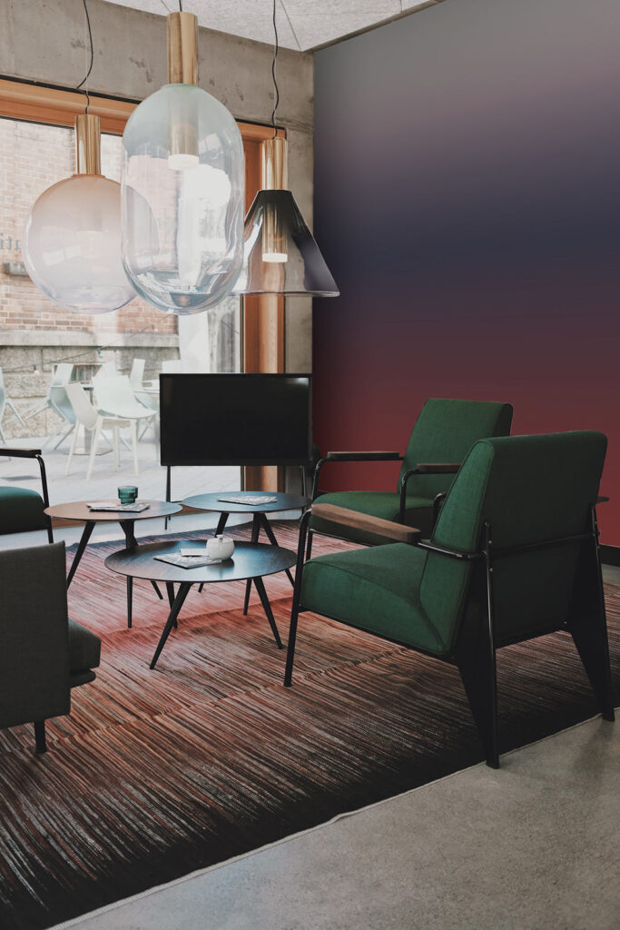 Dark ombre mural wallpaper on an living room accent wall.