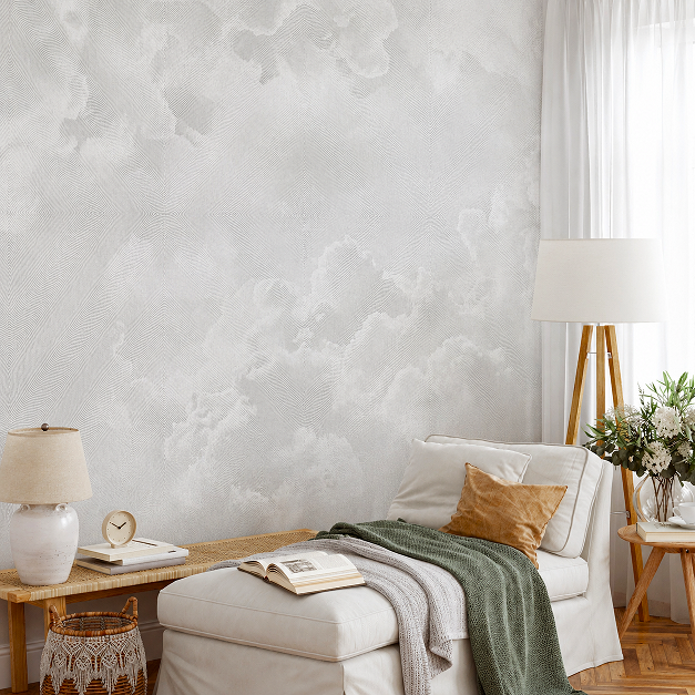 Clouds mural wallpaper in grey, set on a living rooom reading corner feature wall. Baubauwall Wallpapers
