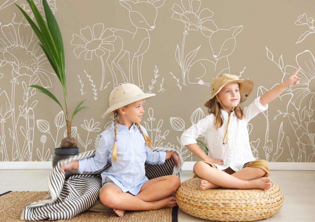 A soft and playful deer nursery wall mural with hand-drawn woodland animals, wildflowers, and delicate little details on a warm beige background. Calm enough for everyday life, sweet enough for a child’s room.