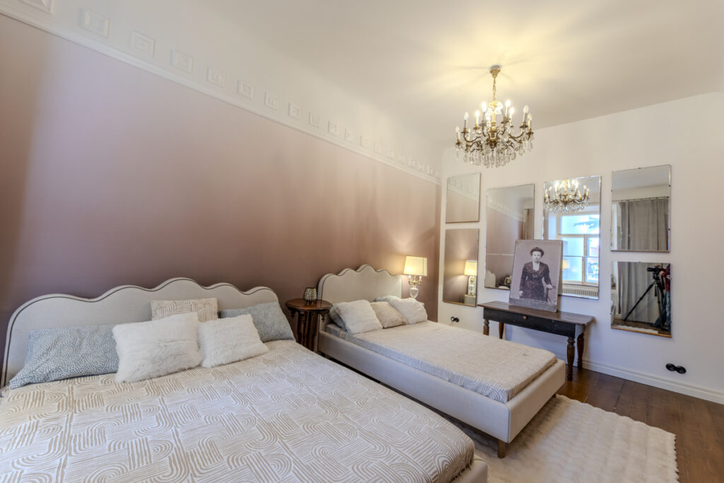 Mocha Mousse Brown wallpaper set on a bedroom wall of a luxurious home. Baubauwall Wallpapers & Murals