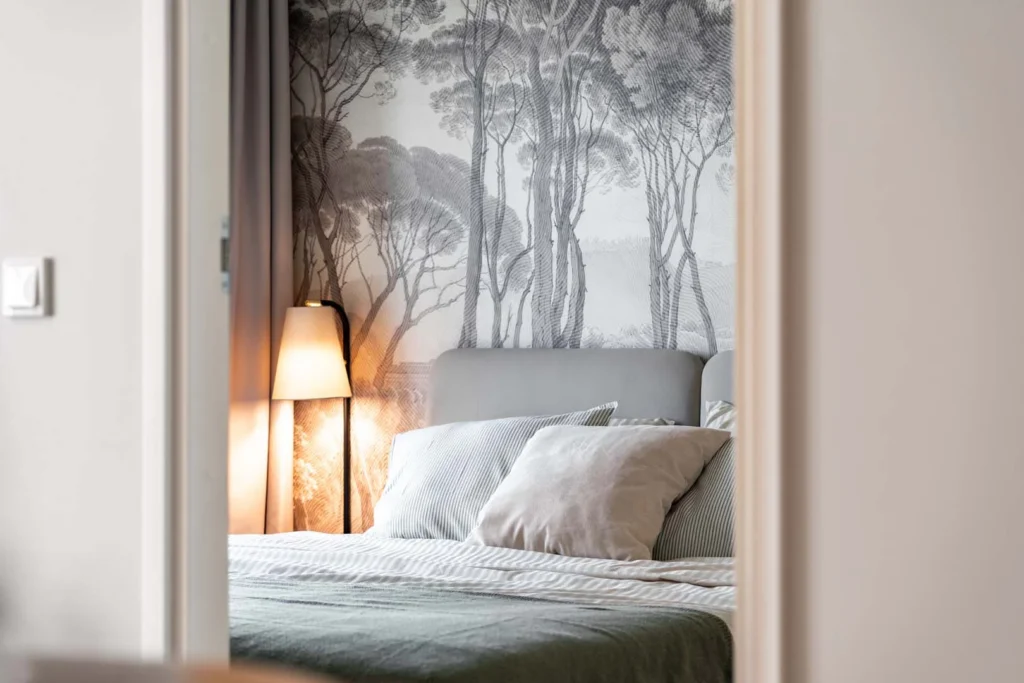Bedroom mural wallpaper with pine trees. Vintage style wall mural by Baubauwall Wallpapers