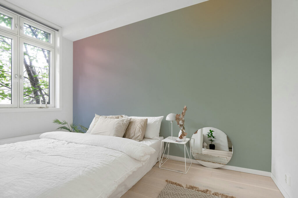 Ombre gradient wallpaper set on a bedroom wall by Baubauwall Wallpapers